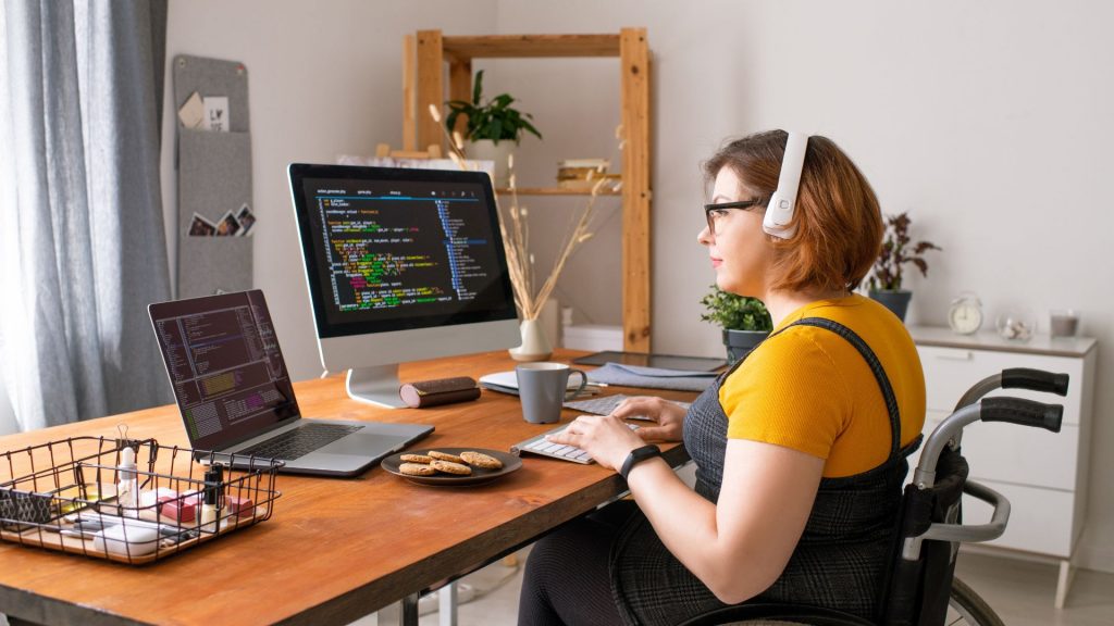 disabled woman codes from home